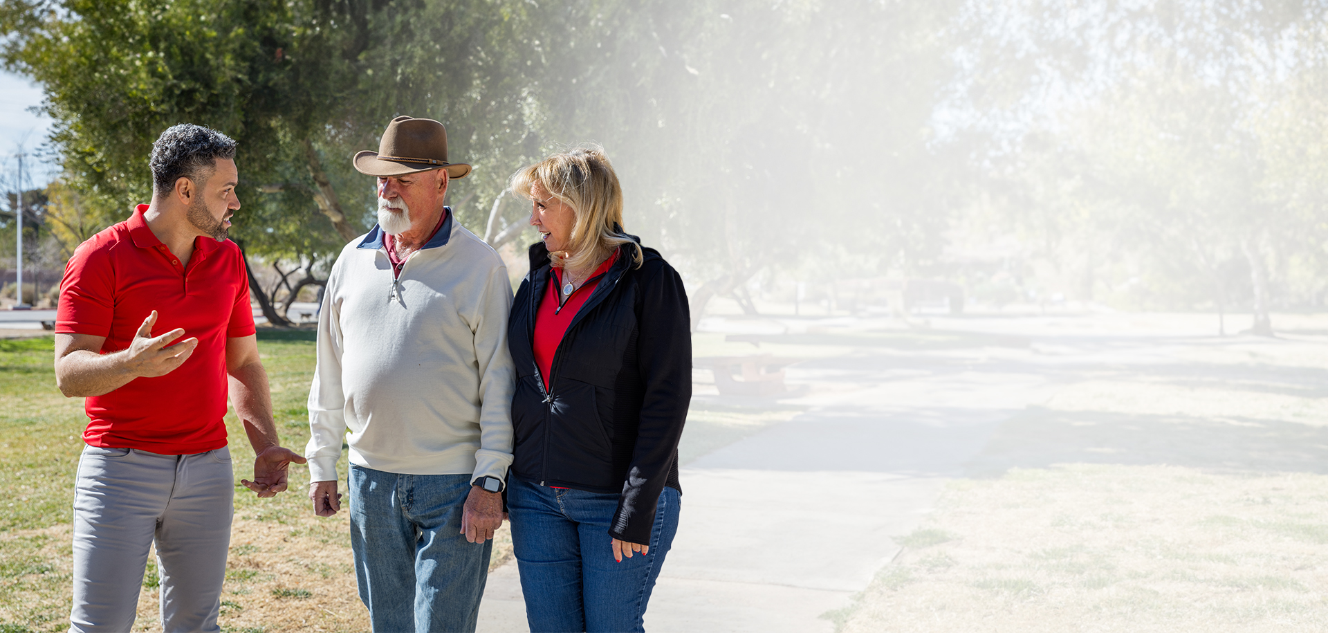 Rafael Arroyo walking and talking with Nevada residents